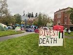 Organizers began setting up early Monday morning on the University of Oregon campus in Eugene. They say the encampment isn’t intended to interfere with campus activities or classes.