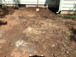 A few inches under the grass, clean-up crews found a layer of gritty, gray soil that was about 12 percent lead.