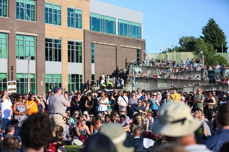 The crowd extended from the edge of Northeast Halsey Street to the steps leading to the transit center bridge.