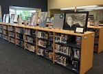 The West Albany High School library is a venue for many student activities, like this past AP Studio Art exhibit. Some of Oregon’s biggest school districts are asking for more funding from the state as they prepare to make major cuts in next school year’s budget, which will impact libraries.