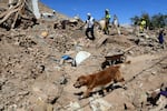 Kilian searches through rubble in Tnirte for this town's last missing person: a nine-year-old girl named Shaima.