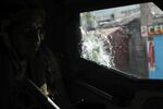 A Kenyan police officer, part of a U.N.-backed multinational force, patrols a street in Port-au-Prince, Haiti, on Dec. 5.