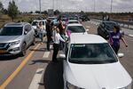 Activists from "Standing Together" set out in a convoy, including a large truck carrying donated dried goods and cans, with the goal of delivering aid directly to Gaza on Thursday, March 7.