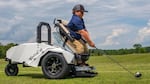 Undated photo of a disabled golfer using VertaCat golf buggy.