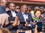 South African President Cyril Ramaphos, center, speaks to reporters after voting his ballot Wednesday, May 29, 2024, for the general elections in Soweto, South Africa. South Africans voted in an election seen as their country’s most important in 30 years. It could put the young democracy in unknown territory.