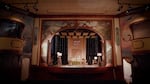 The stage of the newly renovated OK Theatre in Enterprise, Ore., has a hand-carved proscenium by wood carver and Enterprise resident Steve Arment.