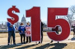 Activists appeal for a $15 minimum wage near the Capitol in Washington in 2021. With the start of the new year, minimum wage increases in Delaware, Illinois and Rhode Island will reach $15 an hour, meaning that 10 states and Washington, D.C., will have minimum wages at or above $15.