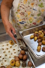 Roasted potatoes, part of the free weekly community meal, on Aug 1, 2026.