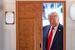 President Donald Trump arrives to speak to reporters aboard Air Force One en route from Joint Base Andrews, Md., to Eau Claire, Wis., Friday, June 5, 2026.