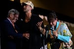 MONROEVILLE, PA-September 28: Lance Wallnau, left, and his wife, Annabelle, heal an attendee at the Courage Tour inside the Monroeville Convention Center on September 28, 2024 in Monroeville, Pennsylvania.(Jeff Swensen for NPR)