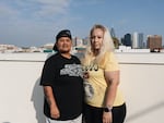 Dulce Volantin (left) and her partner, Valaria Zayas, pose for a portrait on their rooftop in Los Angeles. When asked what this program has meant for her and her partner, Volantin chokes up as she says, "The world, the world."