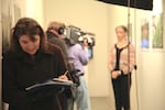 Longtime executive producer of "Oregon Art Beat" Jessica Martin behind the scenes of a shoot.