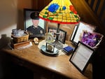 Awards, commendations and personal mementos for fallen Capitol Police Officer Brian Sicknick are set out on a table at his parents’ house.