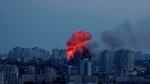 Explosion is seen after Russian air strike on Kyiv, Ukraine, on Friday.