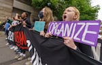 Thousands of area youth climate activists and supporters marched through downtown Portland, May 20, 2022, as part of a youth-led climate mobilization demanding city leaders take meaningful action on climate change.