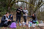 From left, high school student volunteers Alice Meyers, Emely Martinez Ruiz, Kaitlyn Mesta, Belen Hernandez, graduate Abril Hernandez Herrera, Alice Meyers and Marys River Watershed Council education program director Nina Dominici take a lunch break.