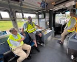 Tom Mills rides in a test bus with members of the TriMet Planning & Mobility team to determine if a turn from Fifth Avenue onto Lombard will be possible for a 40-foot bus on May 14, 2026.