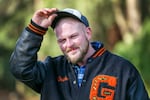 After the City of Portland cleared an encampment of 70-100 people experiencing homelessness in Laurelhurst Park last month, many have returned. Tyler Hardy, one of those who have returned, stands outside his shelter, Dec. 7, 2020.