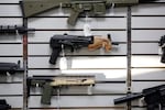 Firearms are on display in a Salem gun shop.