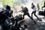 Pro- Trump and pro-police demonstrators clashed with anti-fascist counterprotesters on the 87th day of protests against police violence and systemic racism. Despite violence in the streets, police were notably absent and never declared an unlawful assembly. 