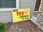 A sign supporting the proposed charter outside the Hartfords' Grants Pass home.