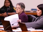 Susan Lorincz (left) listens to testimony during her trial Wednesday in Judge Robert Hodges' courtroom in Ocala, Fla., as her defense attorney Amanda Sizemore also listens.