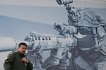 A Polish serviceman stands on an Abrams M1A1 tank during the 2024 International Defence Industry Exhibition in Kielce, Poland on September 3, 2024.