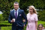 Defense Secretary Pete Hegseth and his wife, Jennifer, attend the White House Easter Egg Roll on April 21.
