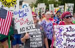 FILE - In this Aug. 6, 2017 file photo, demonstrators against the Keystone XL listen to speakers in Lincoln, Neb. The Trump administration is approving a right-of-way allowing the Keystone XL oil sands pipeline to be built across U.S. land. Federal officials told The Associated Press that Interior Secretary David Bernhardt would sign the approval for about 45 miles of the line's route Wednesday, Jan. 22, 2020. It pushes the controversial $8 billion project closer to construction, but it still faces court challenges. A lawsuit challenging the pipeline is pending before a federal judge in Montana who has previously ruled against the project. The 1,200-mile pipeline would transport up to 830,000 barrels of crude oil daily from western Canada to U.S. refineries.