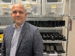 Charley Territo, Hayden AI's chief growth officer, stands in front of camera equipment at the company's offices in New Jersey.