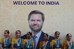 A poster of U.S. Vice President JD Vance is displayed as he arrives in New Delhi, India, on Monday.