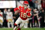 Kansas City Chiefs quarterback Patrick Mahomes (15) rolls out against the San Francisco 49ers during the second half of the NFL Super Bowl 58 football game Sunday, Feb. 11, 2024, in Las Vegas.