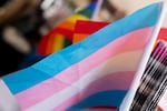 FILE - A transgender pride flag is displayed at a booth during Portland Pride on July 21, 2024, in Portland, Ore.
