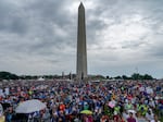 People participate in the second March for Our Lives rally in support of gun control in front of the Washington Monument on Saturday in Washington.