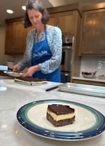 A bitten piece of Nanaimo bar made by Blue Sky Baking owner Rachel Rencher at her home in Portland, Ore., on May 28, 2026.
