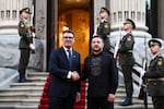 Ukraine's President Volodymyr Zelenskyy welcomes and shakes hands with Britain's Prime Minister Andy Burnham upon his arrival at Horodetskyi House ahead of their bilateral meeting in Kyiv, Monday, Aug. 24, 2026. 