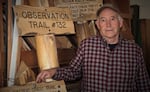 Daniel Finn carries on the tradition of making the iconic trail signs by hand.