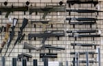 FILE - Guns on display at Gator’s Custom Guns in Kelso, Wash., April 16, 2024.