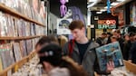 Customers shop at the Shuga Records store during the Record Store Day in Chicago on April 13, 2019. Vinyl record sales have been on the rise for 16 straight years, with an extra bump in demand during the pandemic.
