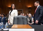 Lori Chavez-DeRemer, left, arrives with Sen. Markwayne Mullin, R-Okla., for a hearing of the Senate Health, Education, Labor, and Pensions Committee on her nomination for secretary of labor, Wednesday, Feb. 19, 2025, on Capitol Hill in Washington.