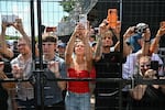 Spectators look on during the IndyCar Freedom 250 Grand Prix.