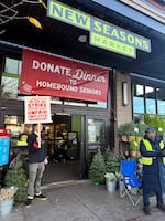 Unionized employees on strike outside the Woodstock New Seasons Market in Southeast Portland, Ore., Nov. 27, 2024.