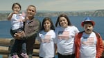 Alma Velazquez celebrates her citizenship with her family after the naturalization ceremony at Crater Lake National Park.