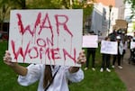 Alexandra Lara of Hillsdale, Ore., was one of hundreds gathered in downtown Portland to protest a leaked draft opinion by the U.S. Supreme Court indicating they would vote to overturn Roe v. Wade, Tuesday, May 3, 2022.