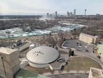 Aerial view of The Turtle with Niagara Falls beyond
