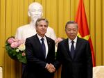 Vietnamese President To Lam, right, shakes hands with U.S. Secretary of State Antony Blinken at the Presidential Palace in Hanoi, Vietnam, on July 27, 2024.