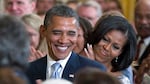 President Barack Obama and first lady Michelle Obama applaud former President George H.W. Bush and former first lady Barbara Bush, not seen, during the portrait unveiling ceremony for former President George W. Bush and former first lady Laura Bush portraits, May 31, 2012, in the East Room of the White House. Obama's presidential portrait will be unveiled on Wednesday.