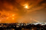 Sun., Oct. 8: Rockets fired by Palestinian militants from Gaza City are intercepted by the Israeli Iron Dome defense missile system.