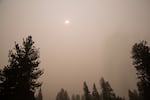 The sun shines through wildfire smoke Saturday, Sept. 12, 2020, near Sisters, Ore. Wildfires have continued to wreak havoc statewide after a hot, dry, windy Labor Day weekend.