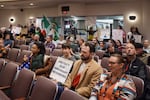 Community members attend a meeting at the Washington County public services building in Hillsboro, Ore., on Oct. 28, 2025. Community members made their case for the commission to declare a state of emergency over a recent increase in immigration enforcement in the area.